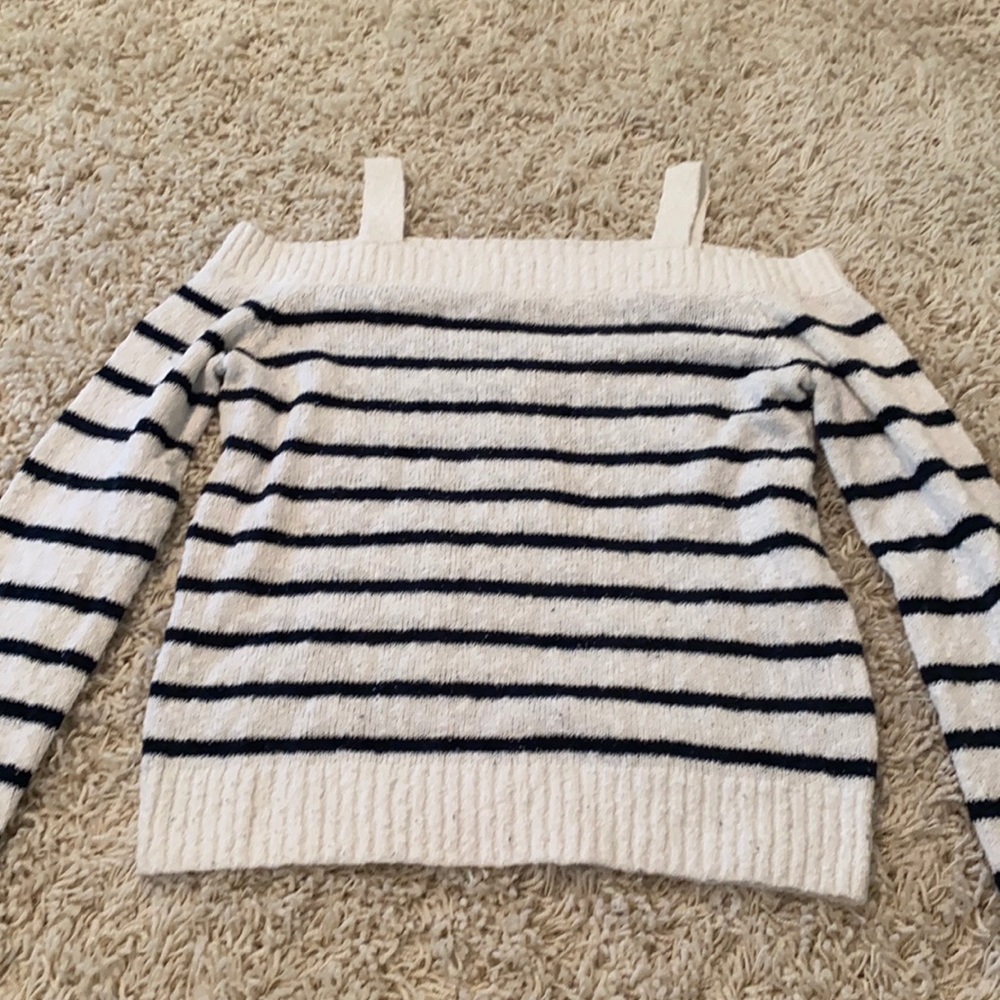 Off the shoulder sweater.